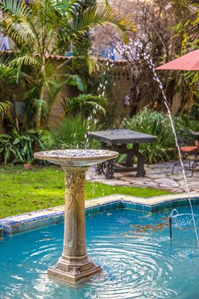 Los Angeles apartment for rent - A fountain in the middle of a pool.