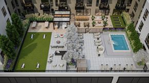 Minneapolis apartment for rent - A large outdoor patio area with a pool and seating area.