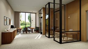 Minneapolis apartment for rent - A modern office space with a glass partition wall and a view of the outdoors.