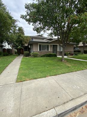 San Jose condo for rent - a sidewalk in front of a house