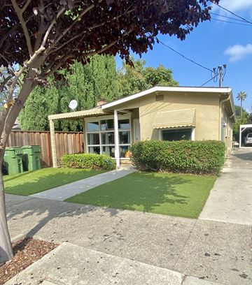 Santa Clara apartment for rent - a small yellow house with a yard and a sidewalk