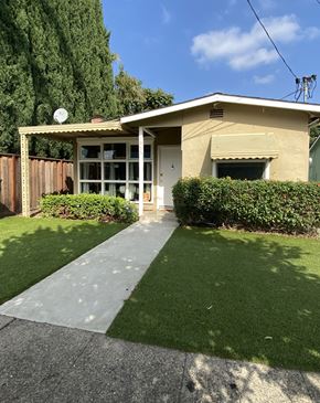 Santa Clara apartment for rent - a small tan house with a sidewalk and lawn
