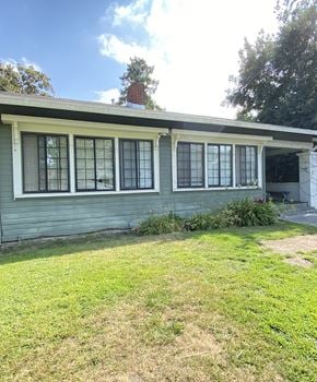 Santa Clara apartment for rent - a blue house with windows and a lawn