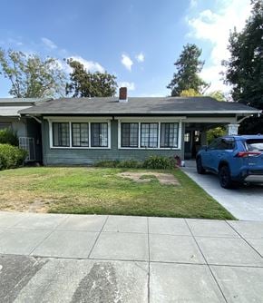 Santa Clara apartment for rent - a green house with a blue car parked in the driveway
