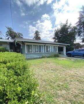 Santa Clara apartment for rent - a house with a lawn and a blue car in front of it