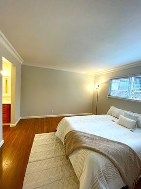 Campbell apartment for rent - a bedroom with a bed and a window