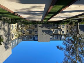 San Bruno apartment for rent - the reflection of an apartment building in the water