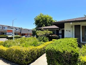 Sunnyvale apartment for rent - Front entrance way of the Exterior of the building with lots of Greenery Prodesse Property Group 418 Brahms Way Sunnyvale CA 94087