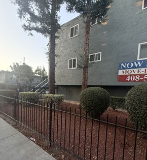 San Jose apartment for rent - A sign on a building that says "NOW MOVE-IN" and the number "408-5".