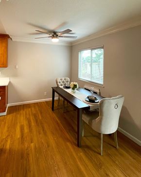 Campbell apartment for rent - a dining room with a table and chairs and a ceiling fan