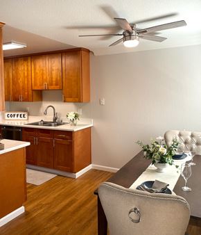 Campbell apartment for rent - a kitchen with a table and a ceiling fan