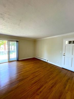 Sunnyvale apartment for rent - Living Room entrance with patio door Exterior of the building with lots of Greenery Prodesse Property Group 418 Brahms Way Sunnyvale CA 94087