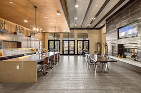 Austin apartment for rent - A modern kitchen with a dining table and chairs. at The Royce at 8100, Austin, TX, 78729