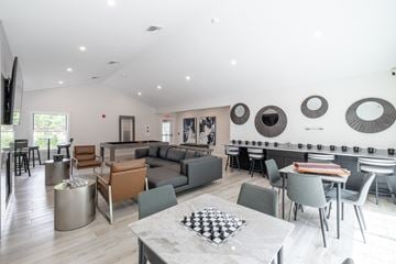 Canton apartment for rent - A modern living room with a checkered table in the middle.