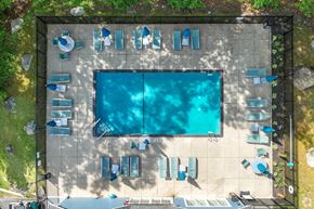 Canton apartment for rent - An aerial view of a swimming pool surrounded by lounge chairs.