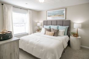 Collierville apartment for rent - Bedroom with a Large Bed at The Addison at Collierville Apartments, Collierville, TN