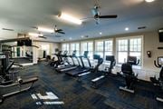 Arden apartment for rent - A gym with treadmills, elliptical machines, and other exercise equipment.
