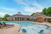 Evans apartment for rent - A pool with a house in the background at Ansley at Town Center Apartments, Evans, 30809