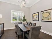 Overland Park apartment for rent - Conference Space with Elegant Lighting and Wood Plank Vinyl Flooring at Cambridge Square Apartments, Overland Park, KS 66211