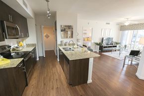 Lake Worth apartment for rent - Model Kitchen and Living room at Casa Brera, Lake Worth, FL
