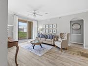 Hardeeville apartment for rent - A living room with a sofa, armchair, and a coffee table.