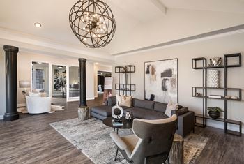 A living room with a couch and a table