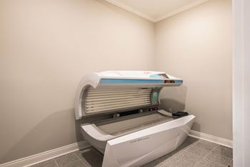 A patient room with an intrauterine machine in a hospital room