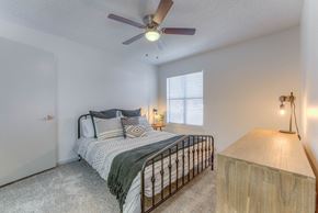 Little Rock apartment for rent - a bedroom with a bed at Brightwaters Apartments, Little Rock, AR