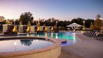 A swimming pool at night at the resort at governors island