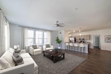 Lakeland apartment for rent - A living room with a white couch and a coffee table.