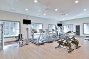 Savannah apartment for rent - a gym with cardio equipment and windows at Legends at Chatham, Savannah, GA