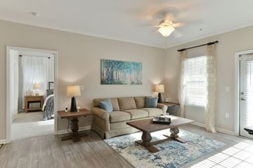 Savannah apartment for rent - a living room with a couch and a coffee table at Legends at Chatham, Georgia, 31405