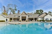 Savannah apartment for rent - a large swimming pool in front of a house at Legends at Chatham, Georgia