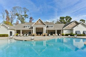 Savannah apartment for rent - a large swimming pool in front of a house at Legends at Chatham, Georgia
