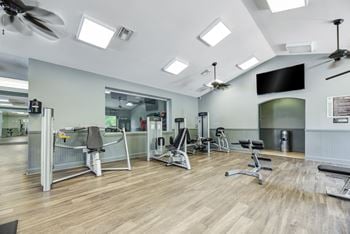 Large state-of-the-art fitness center with fit studio featuring wellbeats system and trx