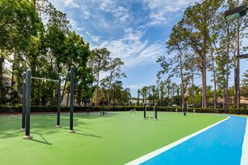 Outdoor fitness court with track