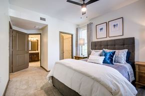 Little Rock apartment for rent - Bedroom with a large bed at The Ridge at Chenal Valley Apartments, Little Rock, 72223