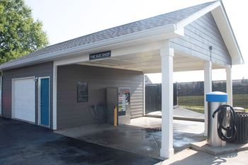 The gas station is in a parking lot