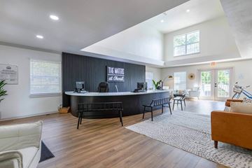 Little Rock apartment for rent - the living room has a large bar and a couch