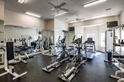 Cordova apartment for rent - Trailside at Greenline spacious gym with a variety of equipment including treadmills, weights, and exercise machines.