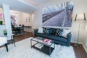 A living room with a couch and a coffee table
