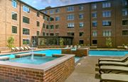 Germantown apartment for rent - A pool with a fountain in the middle of it.