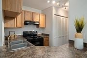 Shawnee apartment for rent - Granite Counter Tops In Kitchen at Hampton Woods, Kansas