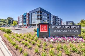 Memphis apartment for rent - A sign for Highland Row Residences and Shops is in front of a building at Highland Row Apartments, Memphis, TN,  38111