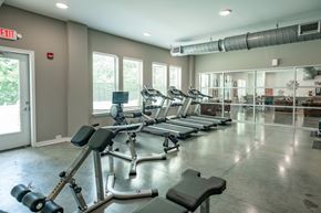 Lakeland apartment for rent - A gym with treadmills, weights, and exercise equipment. at Lakeland Town Square, Tennessee