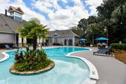 North Charleston apartment for rent - A pool with a small island in the middle of it.