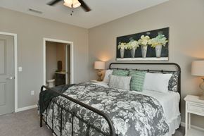 Collierville apartment for rent - Primary bedroom with ceiling fan at Meridian Park in Collierville, TN 38017