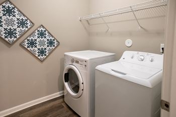 A washer and dryer in a laundry room