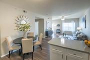 Memphis apartment for rent - A dining room with a round table and chairs. at Park at Forest Hill Apartments, Memphis, TN, 38125