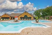 Overland Park townhouse for rent - Enjoy our resort-style outdoor swimming pool and chairs at Pointe Royal in Overland Park, KS